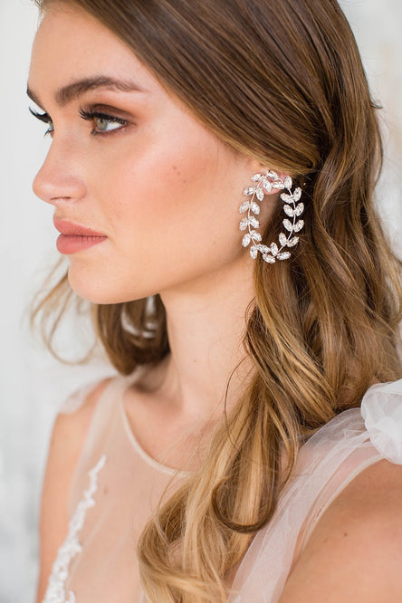 Our earrings are the perfect bridal accessories for your bridal hairstyle and add that touch of sparkle on your wedding day. 